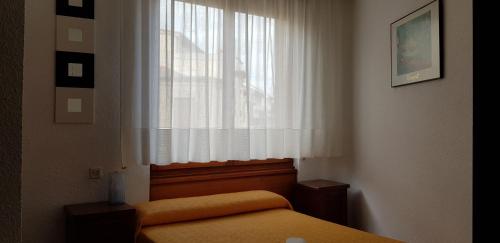 Letto o letti in una camera di Pension Salamanca