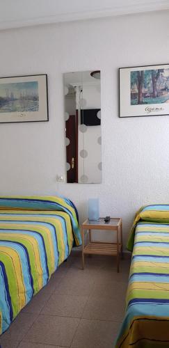 Letto o letti in una camera di Pension Salamanca