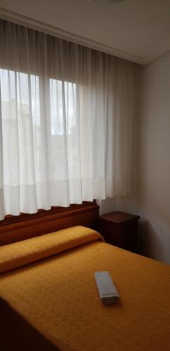 Letto o letti in una camera di Pension Salamanca