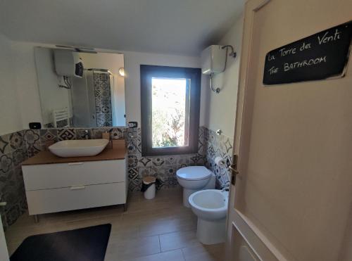 Ein Badezimmer in der Unterkunft B&B Taccu Maccu
