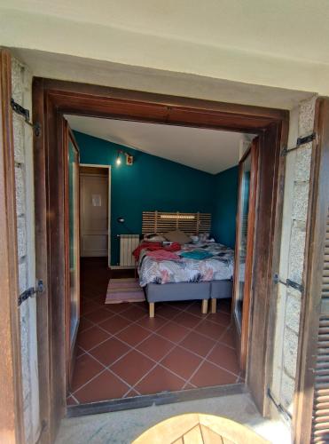 Ein Bett oder Betten in einem Zimmer der Unterkunft B&B Taccu Maccu