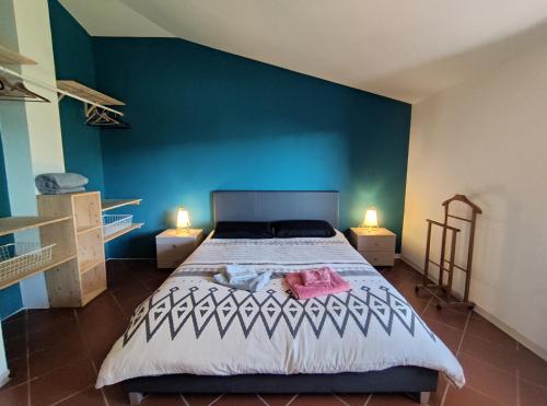 Ein Bett oder Betten in einem Zimmer der Unterkunft B&B Taccu Maccu