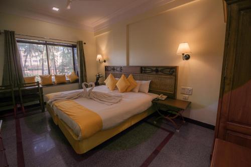 Letto o letti in una camera di Hotel Raj Resort