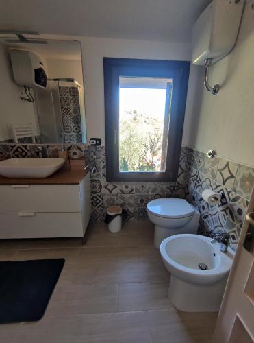 Ein Badezimmer in der Unterkunft B&B Taccu Maccu