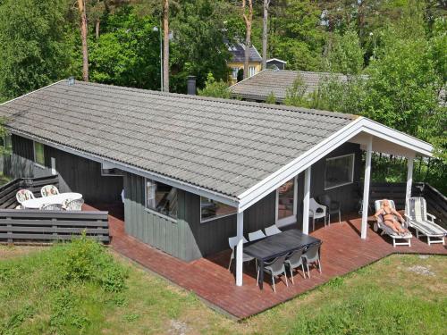 an overhead view of a house with a deck at 8 person holiday home in Nex in Snogebæk