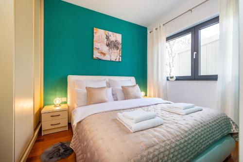 Ένα ή περισσότερα κρεβάτια σε δωμάτιο στο Apartman Darija