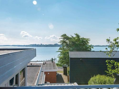 a view of the water from the roof of a house at 3 person holiday home in Gråsten-By Traum in Rønsheved