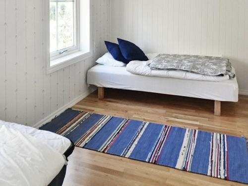 Ένα ή περισσότερα κρεβάτια σε δωμάτιο στο Holiday Home Grendaveien II