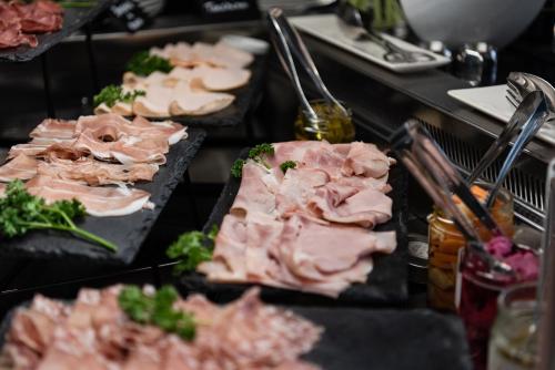 a buffet with many different types of food on display at Carnival Palace - Venice Collection in Venice