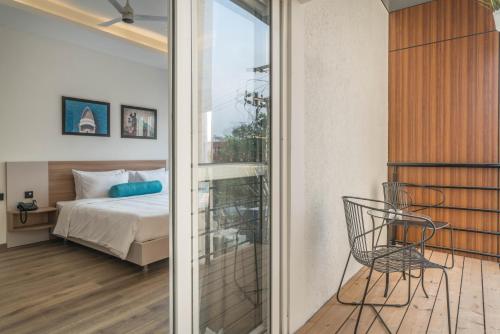 Postel nebo postele na pokoji v ubytování SKYLA Studios & Suites - Jubilee Hills