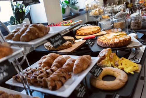 a bakery with a variety of pastries on display at Carnival Palace - Venice Collection in Venice