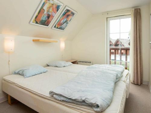 Postel nebo postele na pokoji v ubytování Luxury Retreat with Sea View - By Traum Ferienwohnungen