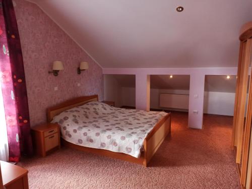 Postel nebo postele na pokoji v ubytování Central Hotel