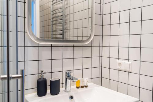 Ванна кімната в Beautiful apartment in the heart of Kaunas