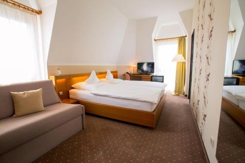 Postel nebo postele na pokoji v ubytování Hotel Marienlinde