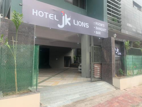a hotel klus sign in front of a building at JK Rooms 147 Lions - Koradi Nagpur in Nagpur