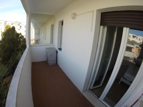 Ein Balkon oder eine Terrasse in der Unterkunft Appartamento Corallo