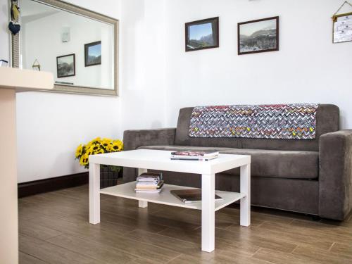 A seating area at Apartment Casa Rasat-1 by Interhome