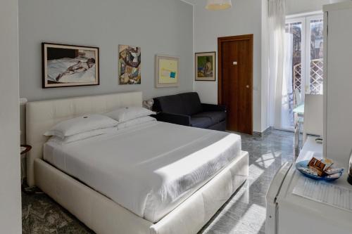Posteľ alebo postele v izbe v ubytovaní Aiello Suites Executive