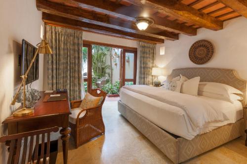 Postel nebo postele na pokoji v ubytování Hotel Casa San Agustin