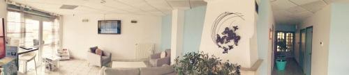 Ένα μπάνιο στο Logis Hotel- Restaurant La Haie Des Vignes Séminaires et Evènementiel