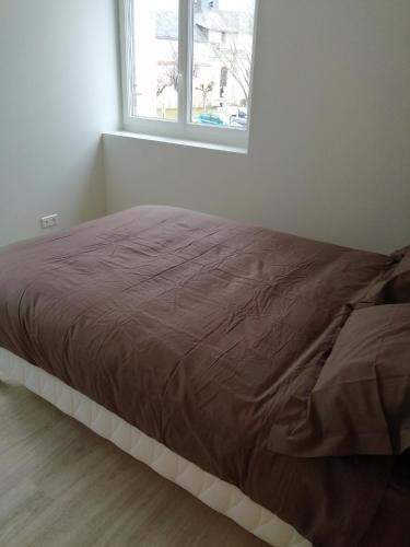 Postel nebo postele na pokoji v ubytování Le Jardin des Saisons