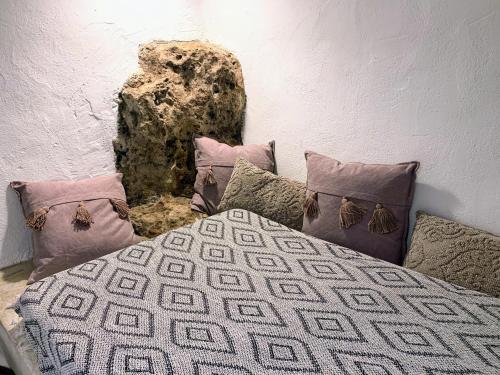 Postel nebo postele na pokoji v ubytování Villa Aspros - traditionell, ruhig und strandnah