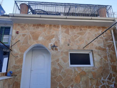 Balcone o terrazza di Villa Aspros - traditionell, ruhig und strandnah