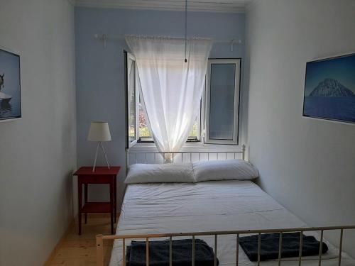 Letto o letti in una camera di Villa Aspros - traditionell, ruhig und strandnah