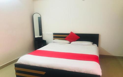 Postel nebo postele na pokoji v ubytování Green Valley Residency