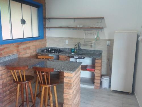 Una cocina o cocineta en Pousada Campestre Sítio da Lua