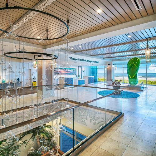 a large room with glass display cases in it at Margaritaville Jacksonville Beach in Jacksonville Beach