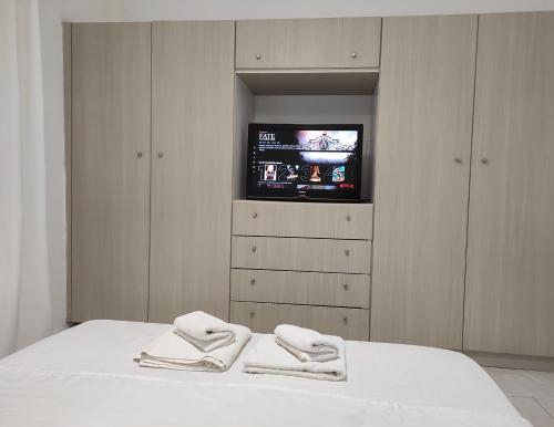 Posteľ alebo postele v izbe v ubytovaní Ina's apartments