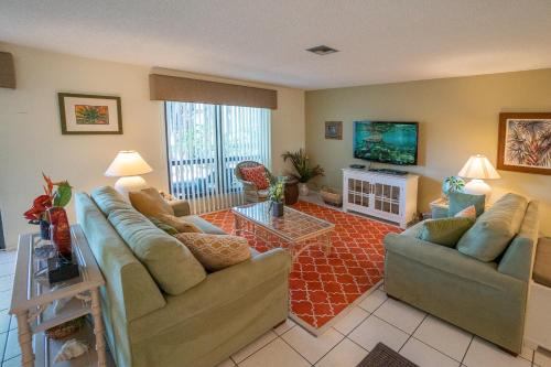 Family style beach resort condo on quiet west end A104