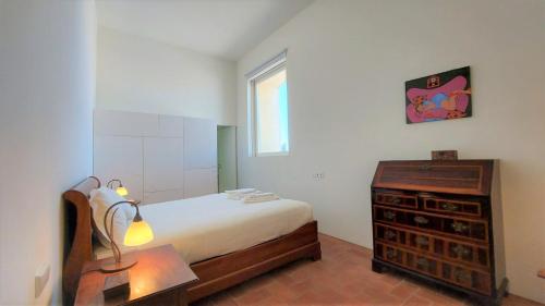 Uma cama ou camas num quarto em Convento Bernardas duplex - 3 bedroom