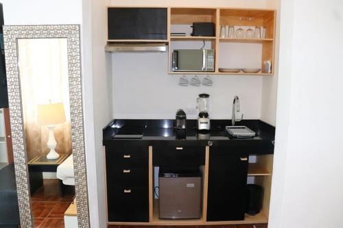 Kuchyň nebo kuchyňský kout v ubytování Casa Gem B&B