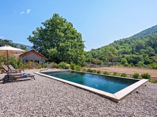 a swimming pool in the middle of a yard at VIlla in Bargemon with Private Swimming Pool in Bargemon