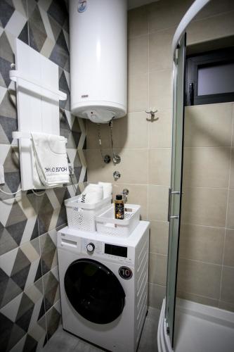 Ein Badezimmer in der Unterkunft House of Mac Apartments