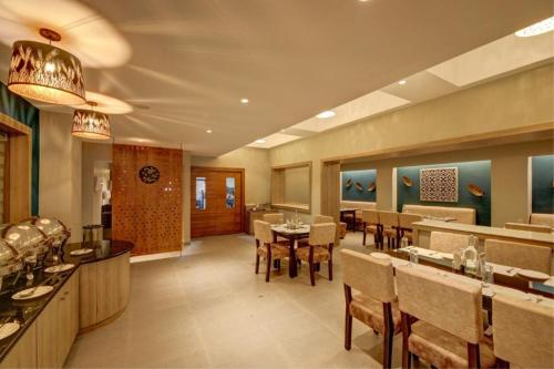 IMA Houseにあるレストランまたは飲食店