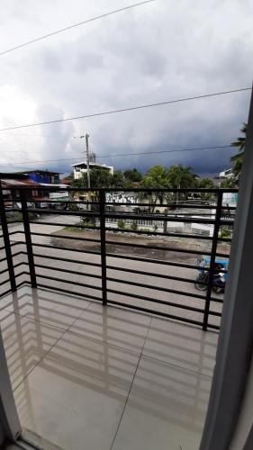 a view of a train station from a window at Livewire Planet Suites in General Santos