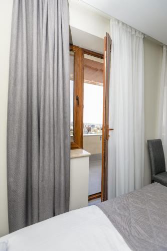 Una cama o camas en una habitación de Bien hotel