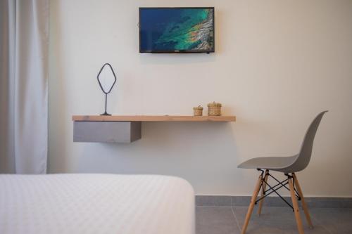 Televisyen dan/atau pusat hiburan di Anemelia Luxury Apartments