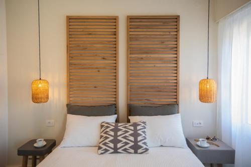 Katil atau katil-katil dalam bilik di Anemelia Luxury Apartments