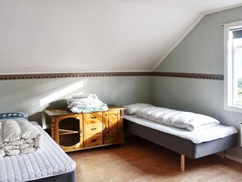 Ένα ή περισσότερα κρεβάτια σε δωμάτιο στο Holiday home MIDSUND V