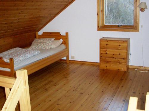 Postelja oz. postelje v sobi nastanitve Four-Bedroom Holiday home in Lindesnesnes 1