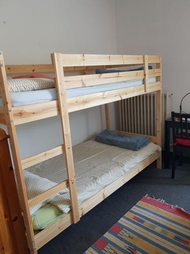 a bunk bed room with two bunk beds at Guesthouse La Rocca in Grassobbio
