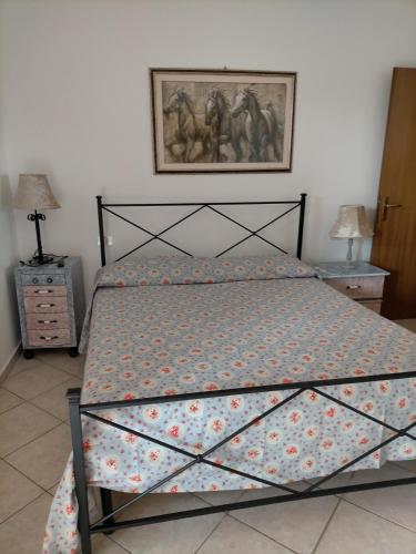 Ένα ή περισσότερα κρεβάτια σε δωμάτιο στο Fattoria San Vincenzo