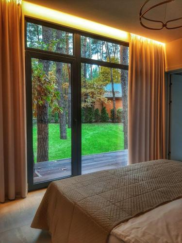 Una cama o camas en una habitación de ONOVO Dendra Hotel