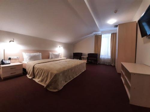 Una cama o camas en una habitación de ONOVO Dendra Hotel