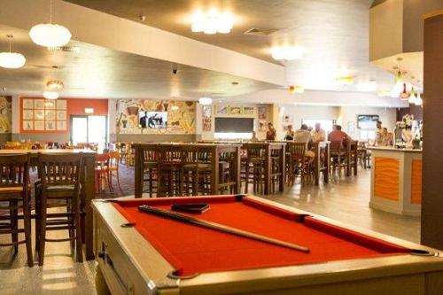 a pool table in a restaurant with a bar at PRIVATELY OWNED Stunning Caravan Seawick Holiday Park St Osyth in Jaywick Sands